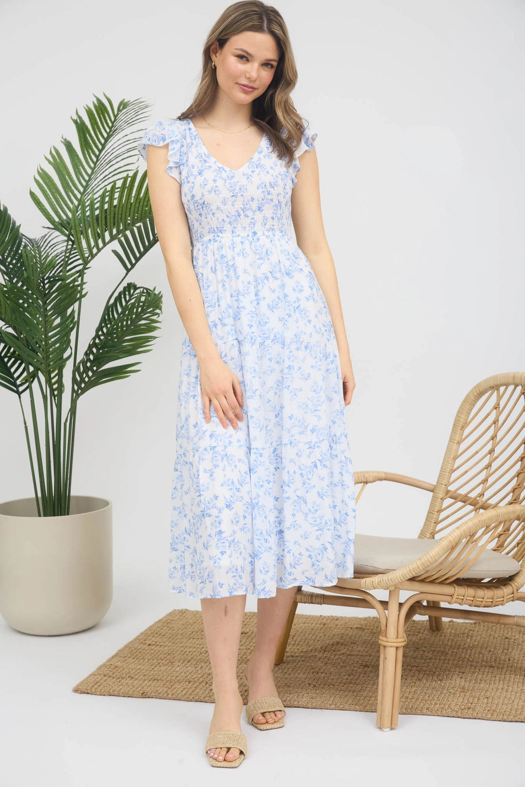Floral V Neck Smocked Short Sleeve Midi Dress in Blue